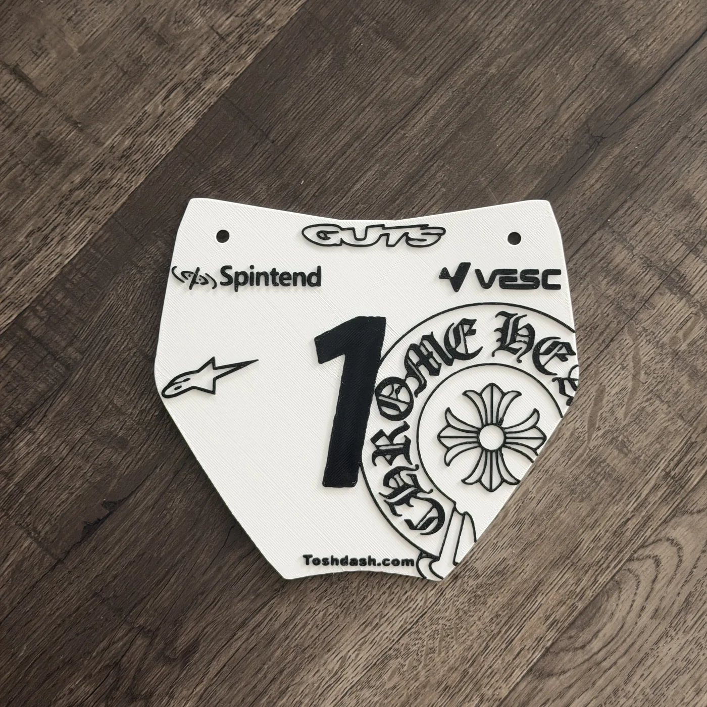 Customer plate in white with black print, angled